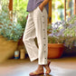 Casual, effen, ruimvallende cropped broek met knopen aan de zijkan