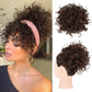 Korte, gekrulde chignon met elastisch trekkoord