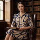 Damesjurk met knopen en geometrische print