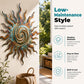 Wanddecoratie met metalen zonnesilhoue