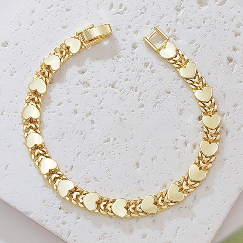 Elegante goudkleurige hartjesarmband – afbeelding 9